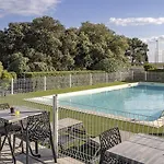 Sure By Western Nimes Est
